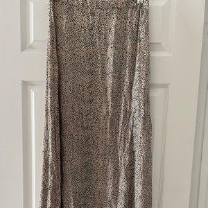 Billabong womans long skirt. Side zip, leaopard  print